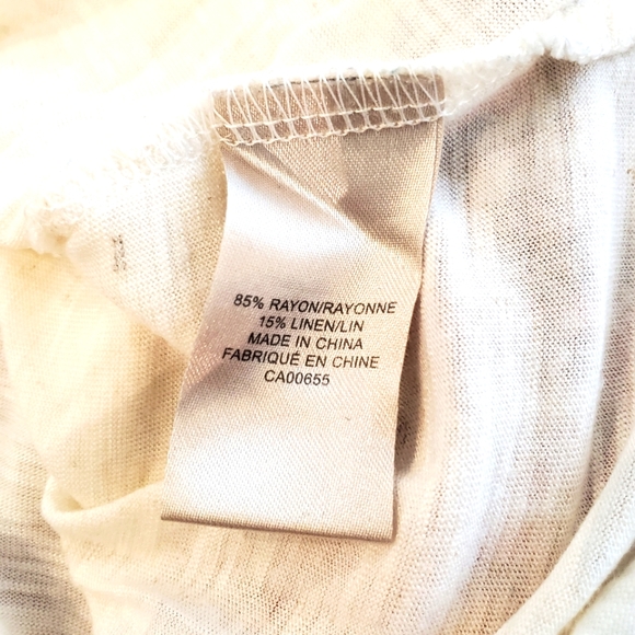 Elegant lightweight top w/ ruffles and pearl like beads. Stretchy. - Picture 9 of 10